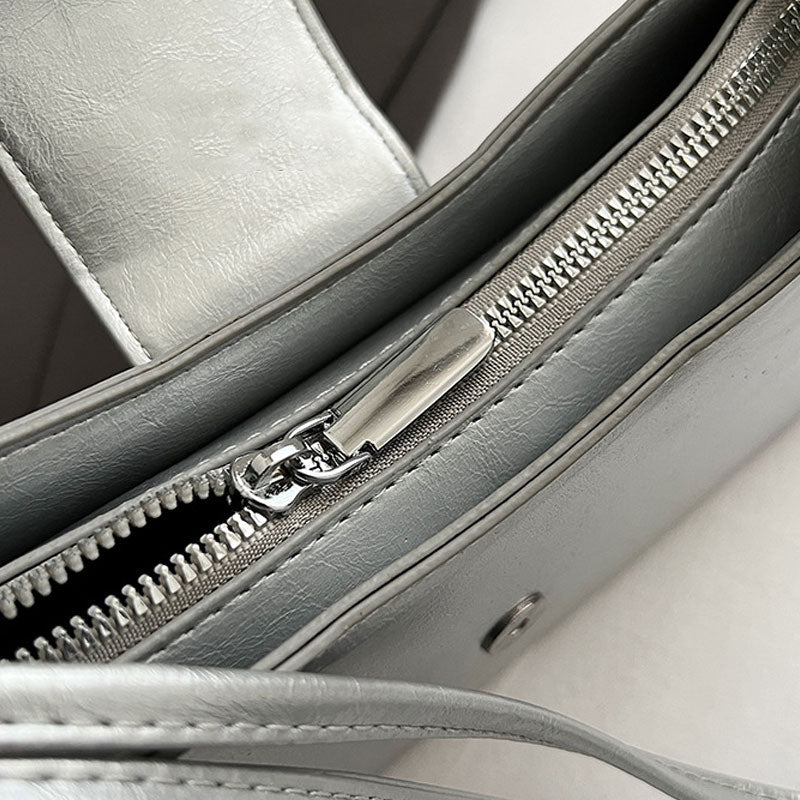 Commuter Bow kainalolaukku