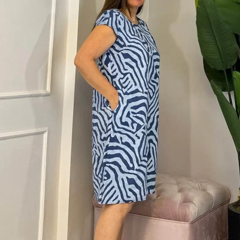 🌸 Kesäinen boheemi kukkamekko, jossa on pyöreä päänti